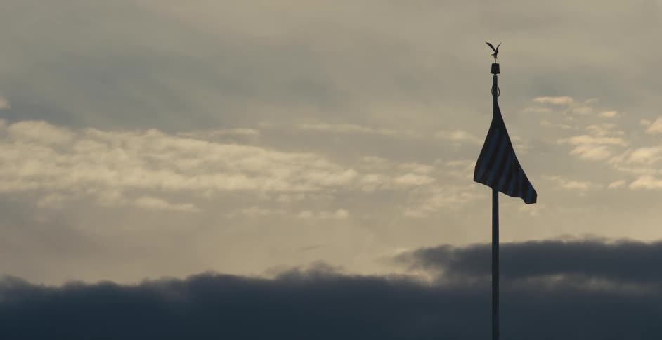 An American flag at sunset