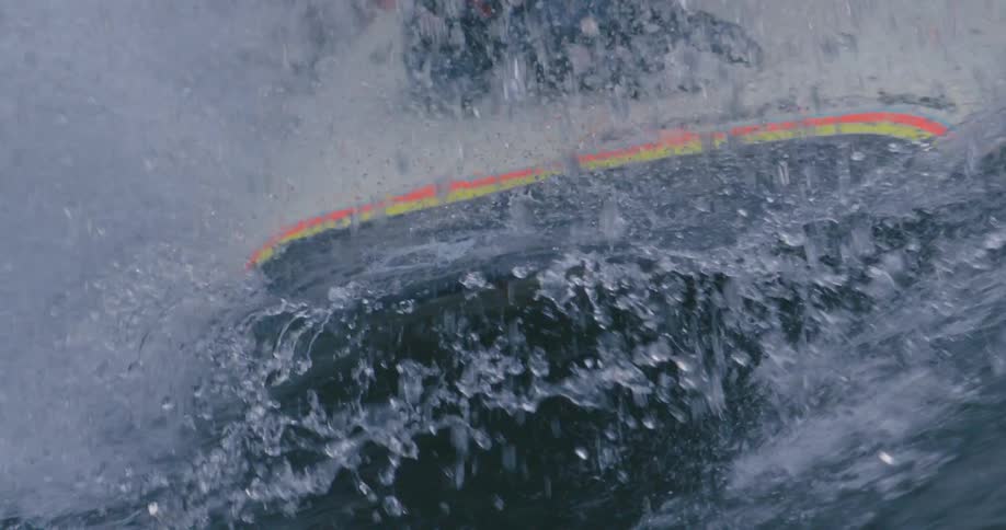 Close up of a person surfing in the water
