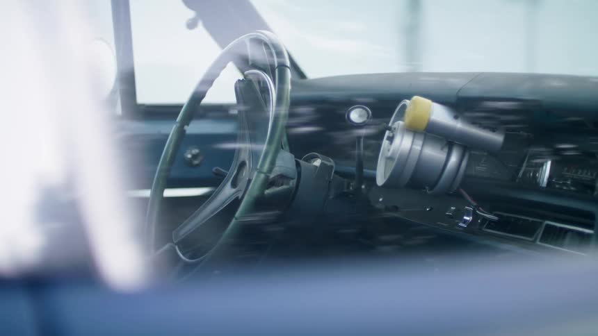 Custom racing gauges on the dashboard of a classic car