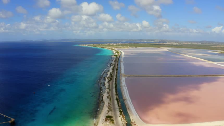 A single road runs by the shore
