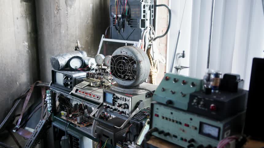 Scientific and electronic equipment over the shelves of a workshop