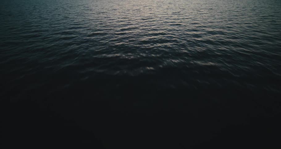 Sunlight is shining on the ocean waves