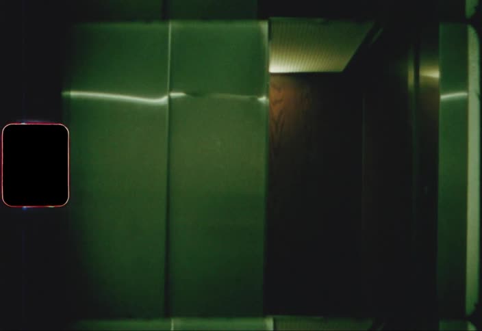 The elevator door closes on the man inside