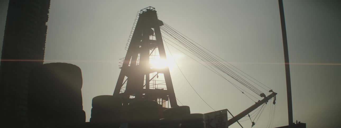 A construction crane and equipment at a construction site
