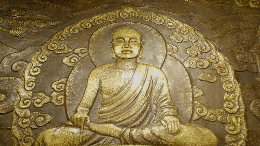 A picture of monks on a gold setting
