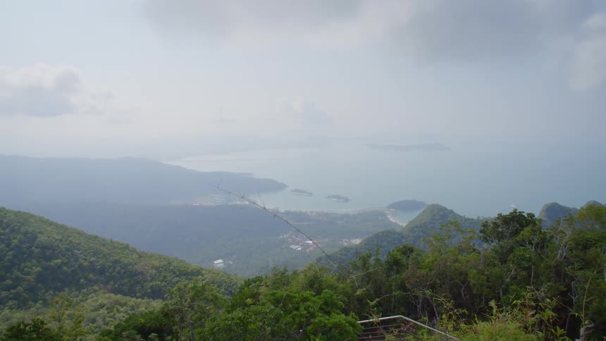 Small coastal town in the bay next to the mountains