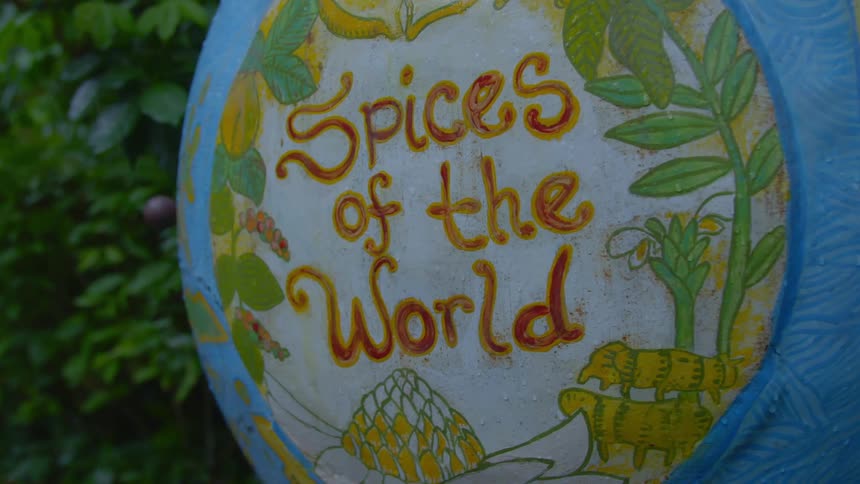 A sign that advertises spices around the world
