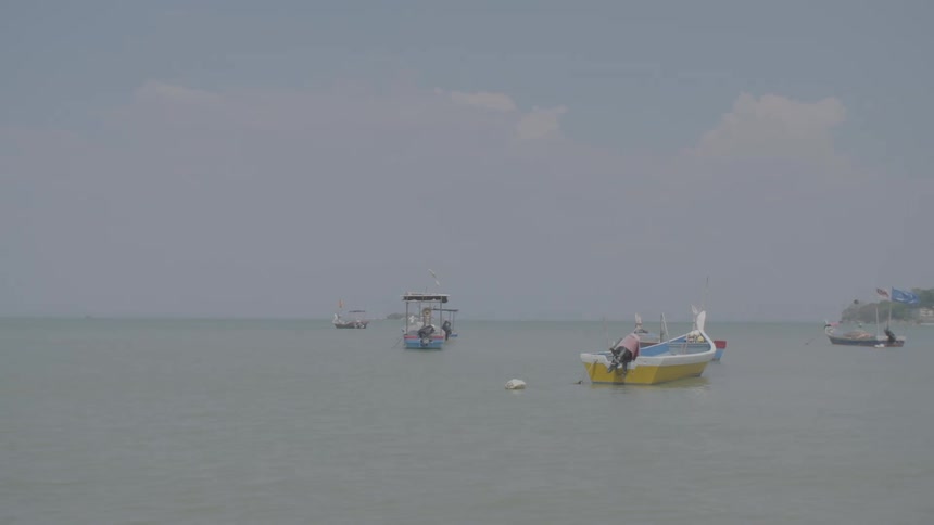 Boats docked in the water