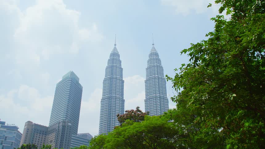 The petronas towers on the skyline of kuala lumpur