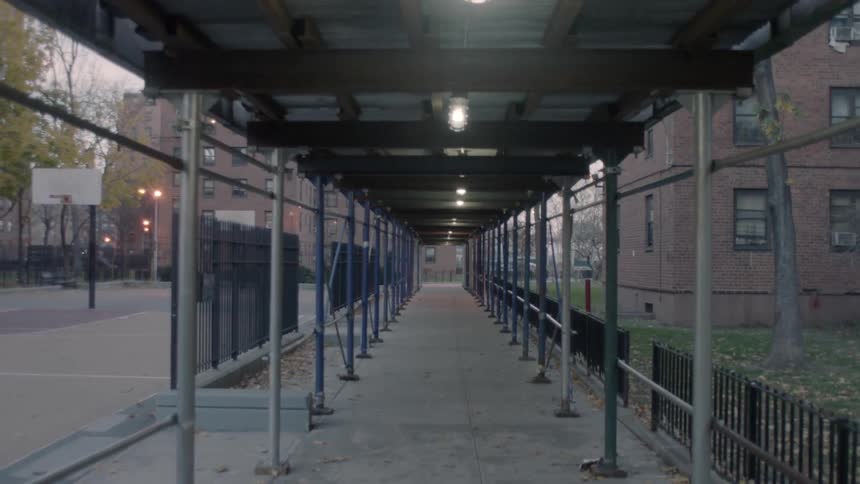 An abandoned walkway in the middle of a city