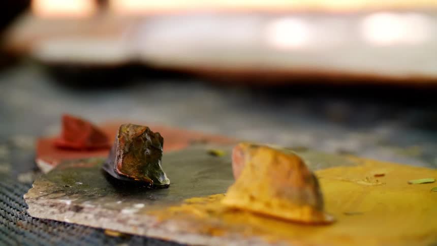 Red, black and yellow ochre