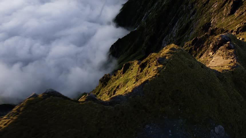 The mountain is taller than the clouds