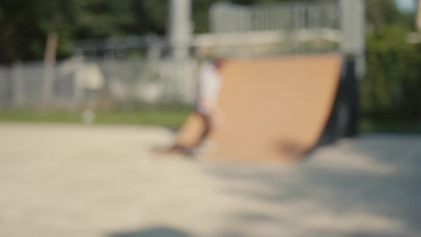 An outdoor skatepark on a sunny day