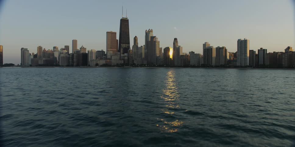 Moving over the water towards a city
