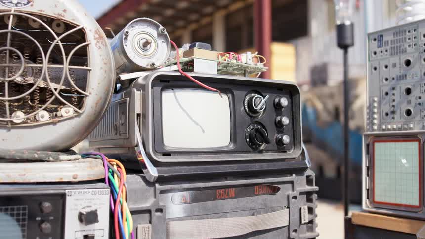 Vintage electronic equipment with knobs and tube display