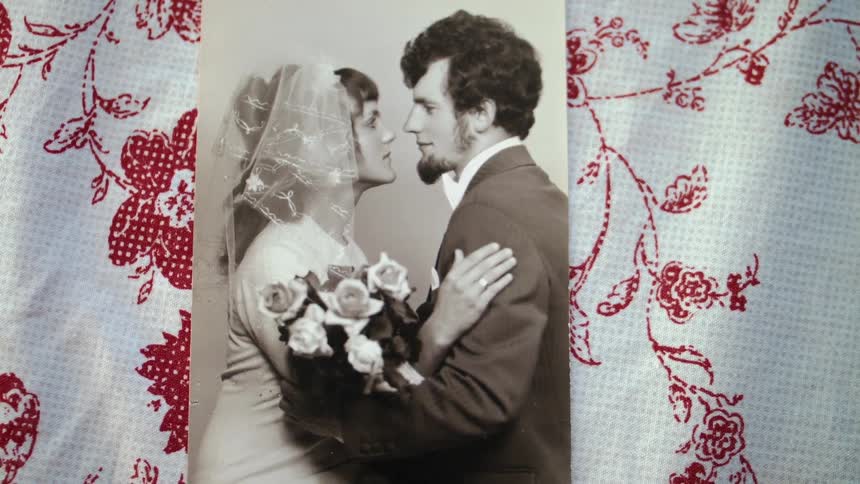 An old black and white wedding photo of a man and a woman