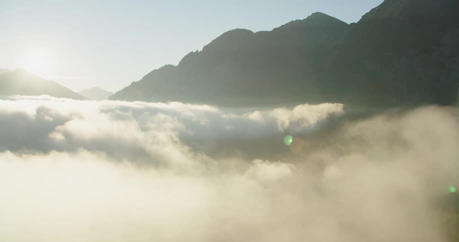 The tall mountain reaches above the clouds