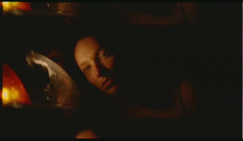 A woman lying down at home