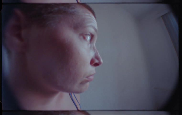Profile view of woman with buzz cut