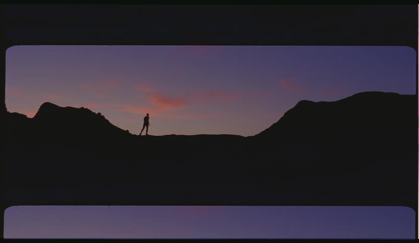 A person climbing up a hill