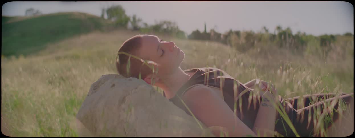 A woman is relaxing outdoors in spring
