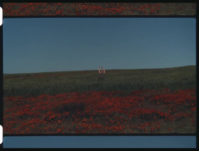 A person is dancing on the hill