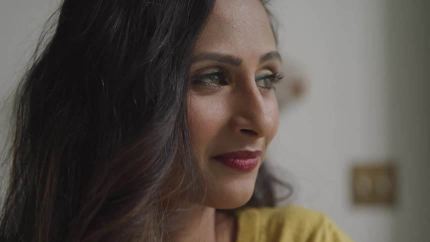 Close up of a woman relaxing on a room at home