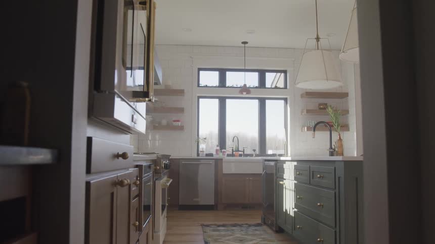 View of a modern and clean kitchen with kitchen island