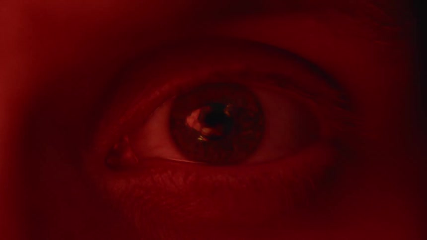 Flames reflect off of an eyeball