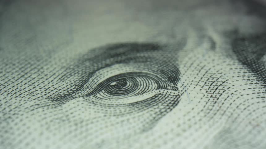 A close up of a dollar bill