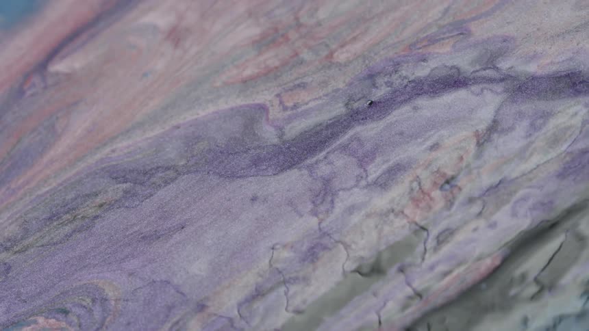 Flowing purple and pink paint