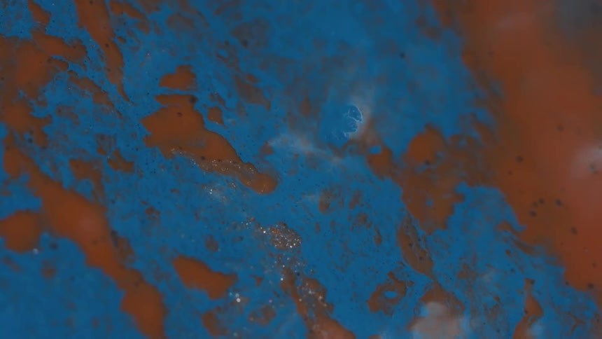 Blue and brown liquid in motion