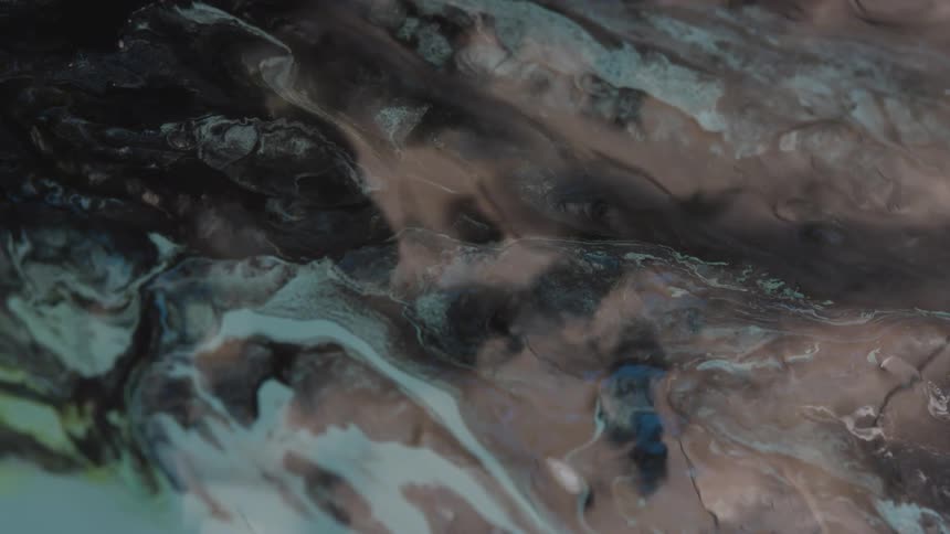 Flowing brown and black fluid