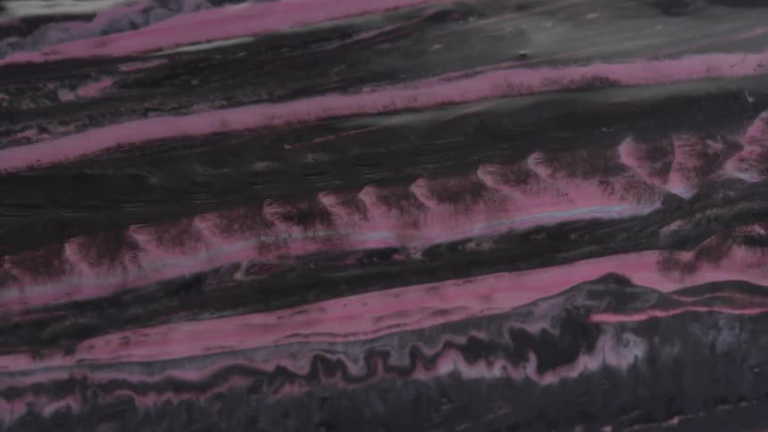 Purple mauve white and pink waves of paint flow and ebb