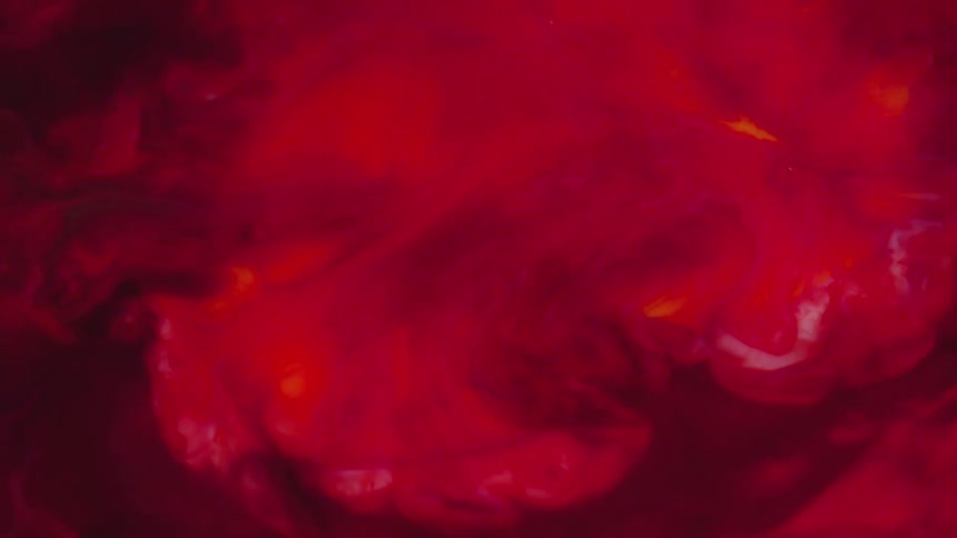 Movement of red and orange liquid
