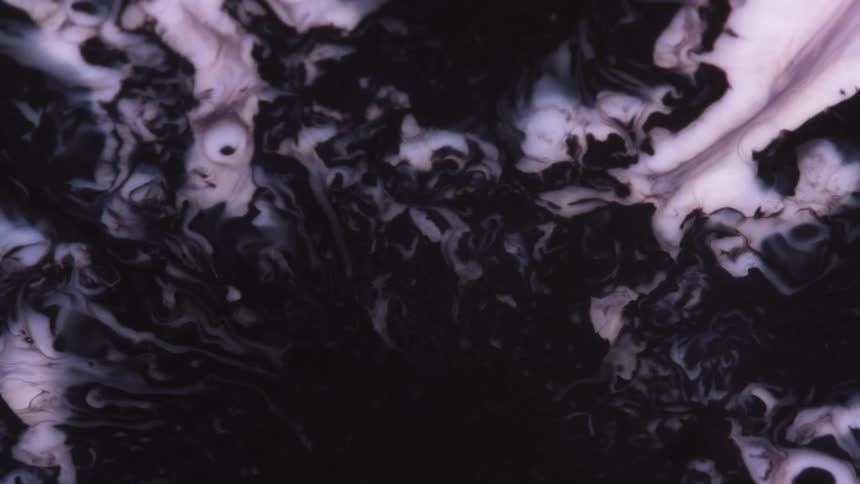 Flowing black and white liquid