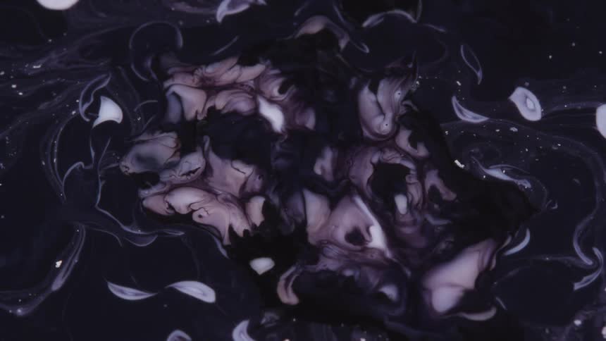 White streaks and forms contrast against dark blues and blacks