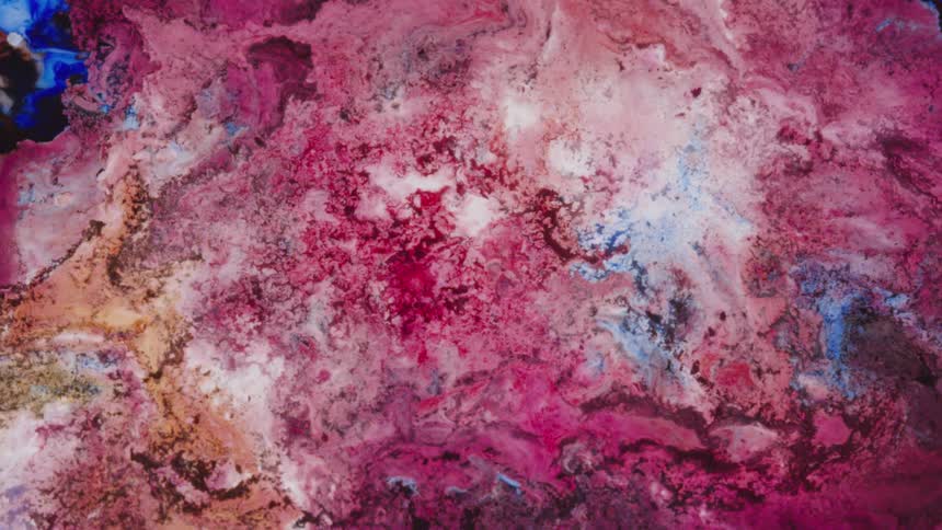 White flows out from center of mixture of primary colors