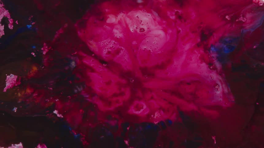 Movement of red and white liquid