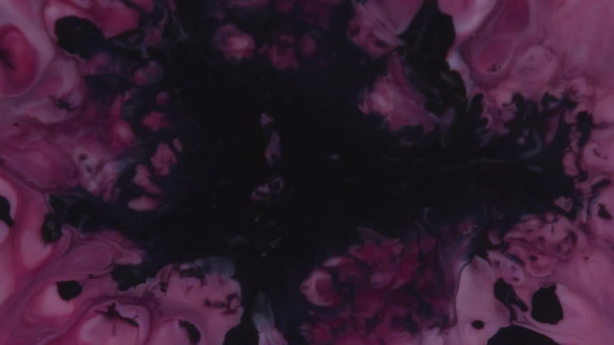 The black and and purple colors are mixing around