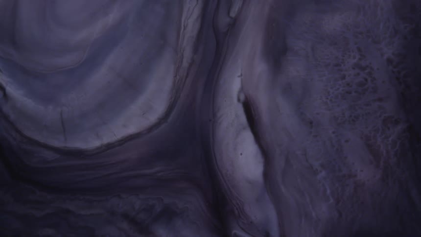Flowing white and black liquid