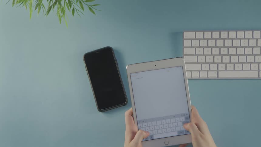 A woman is texting on a smart phone