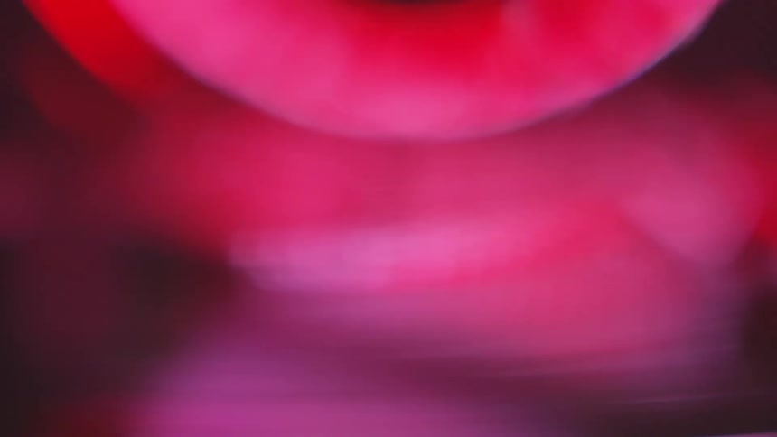 Abstract blurred colorful light gradients in movement