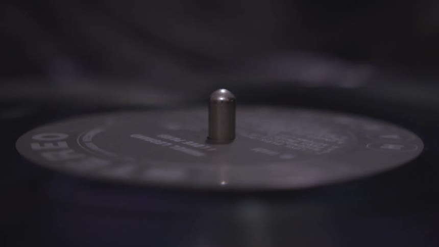An album spinning on a record player