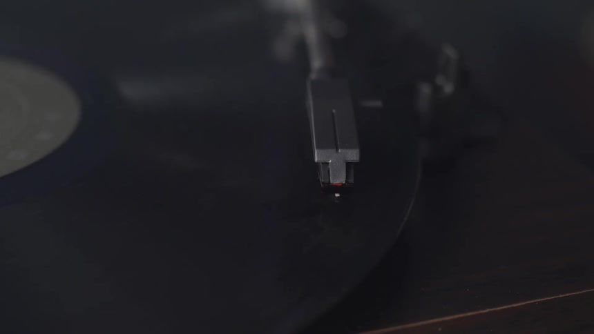 The record player is playing