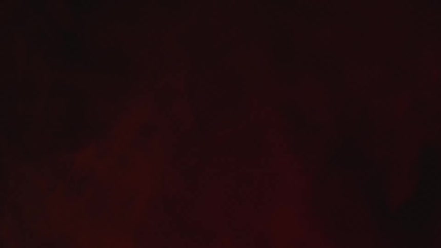 Red white and black colors that look like smoke rising