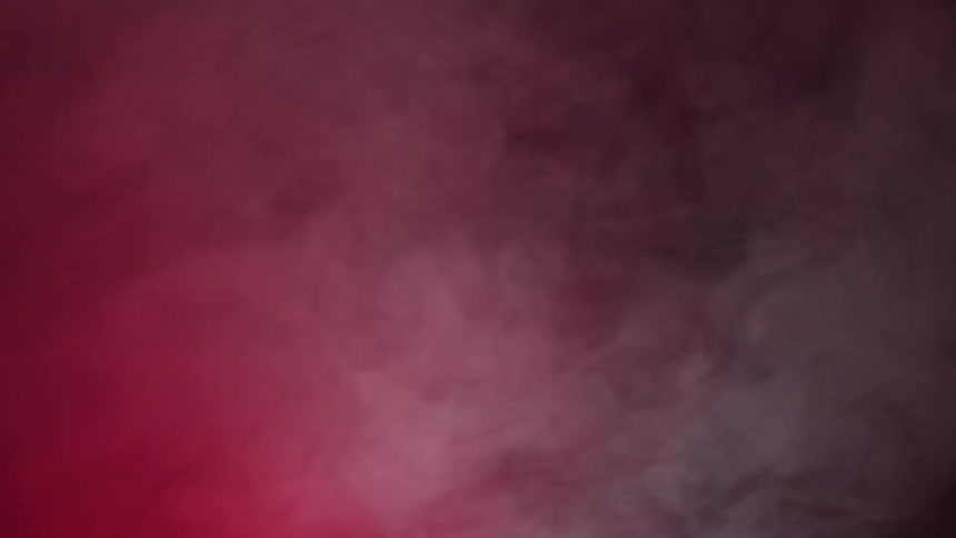 Swirling red and white smoke