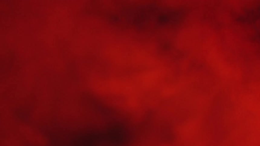 Red smoke billowing in the dark