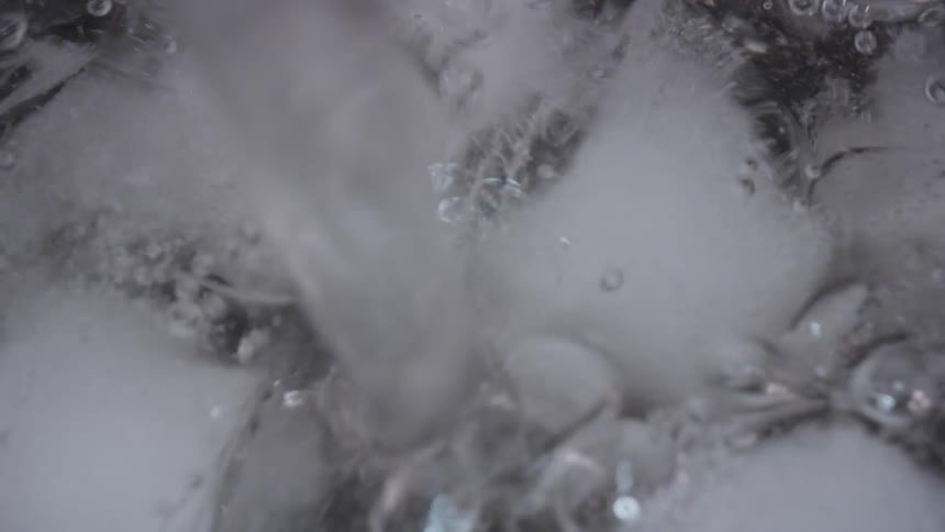 Water being poured over ice