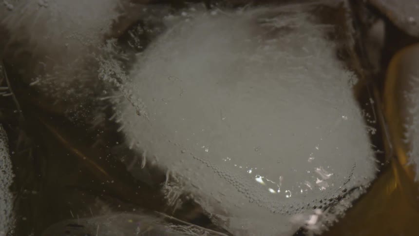 The glass is filled with ice